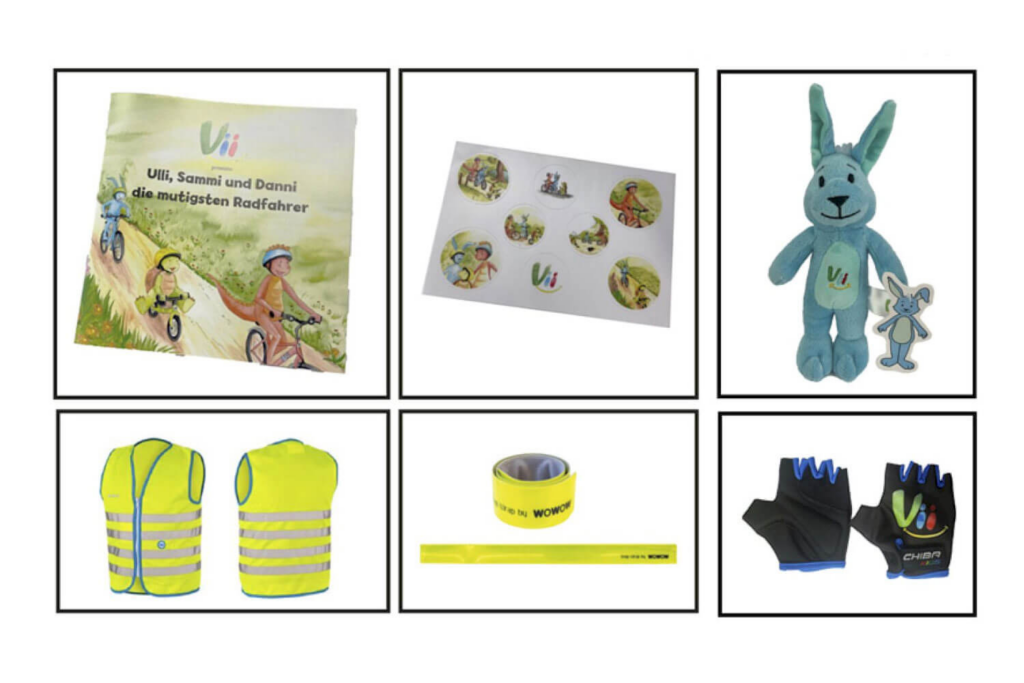 vii Riders Paket Sammi
Geschichten-Buch
Sticker
Kuscheltier "Sammi"
Warnweste
Reflektoren-Streifen
Kinder-Fahrradhandschuhe